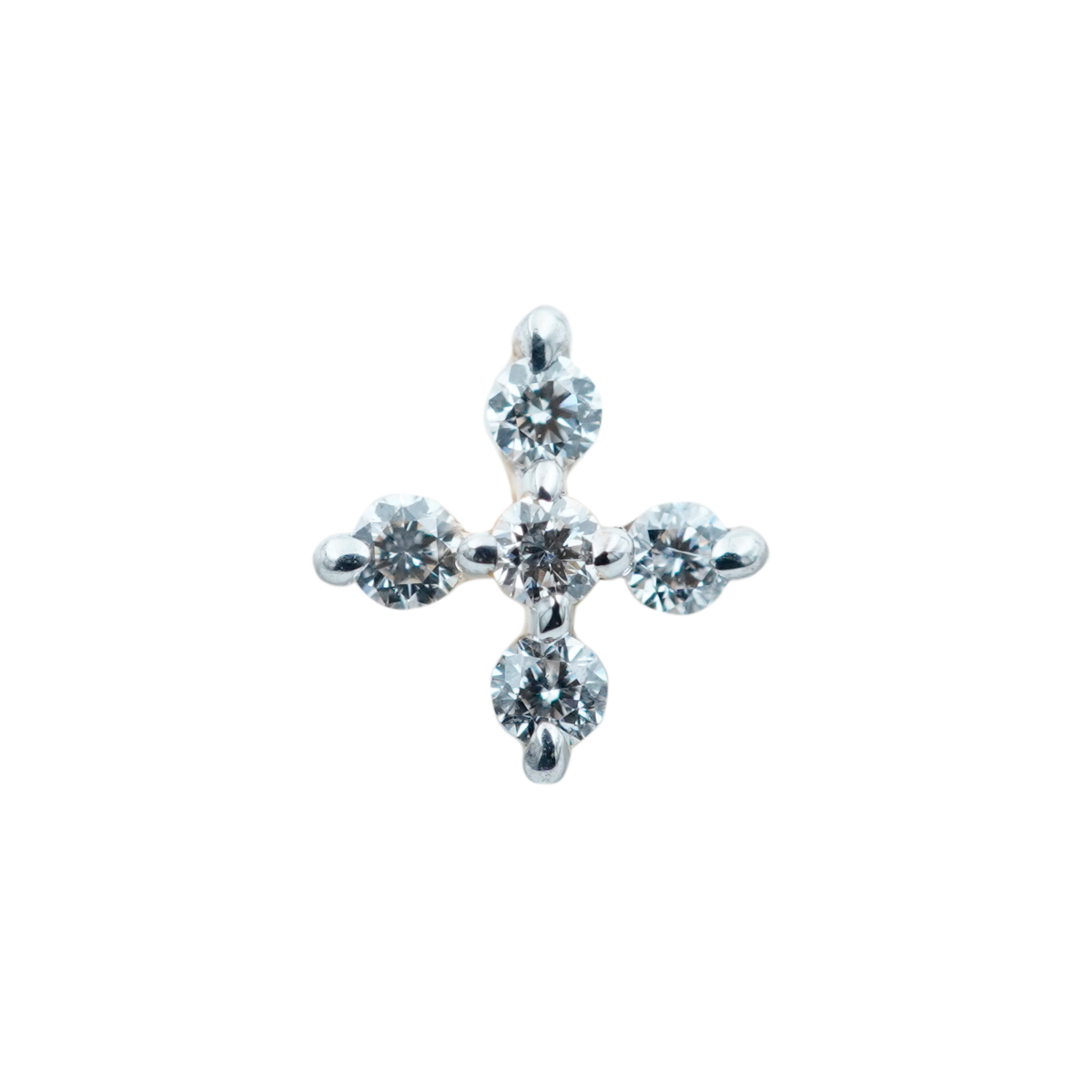 close- up image of minimal five stone diamond nose pin